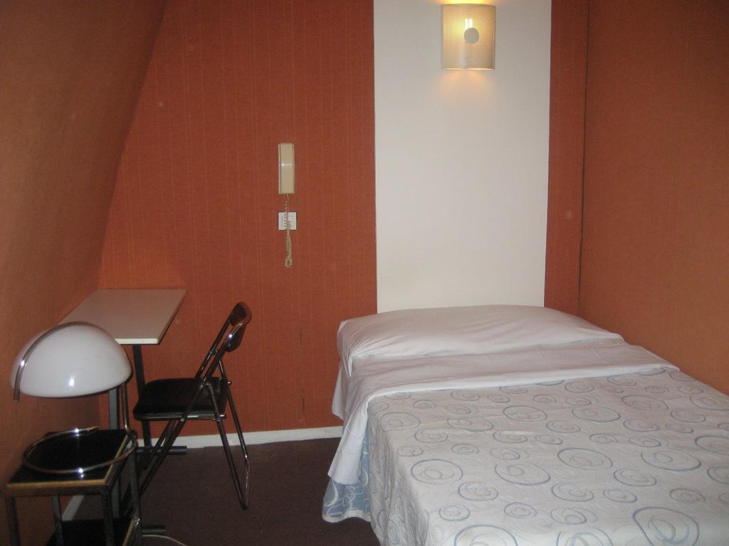 Hotel Meteore Paris Quarto foto